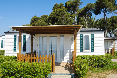 closeup of a mobile home in a campsite on the beach